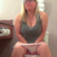 A plump blonde woman wearing glasses sits down on a toilet, takes a splattering, wet shit and a piss, then farts farts repeatedly while trying to push out more shit. More crazy toilet farting! Presented in 720P HD. Over 4 minutes.